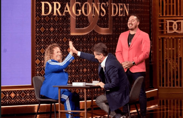 Bryce Lokken on Dragon's Den as the hosts high five
